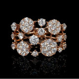 Bague antique en or rose avec pierres brillantes