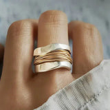 Bague en argent avec fils d'or
