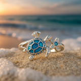 Bague en argent avec tortue et opale bleue