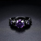 Bague ronde rétro noire avec pierre précieuse violette et design complexe | Or