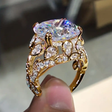 Bague vintage dorée avec verre