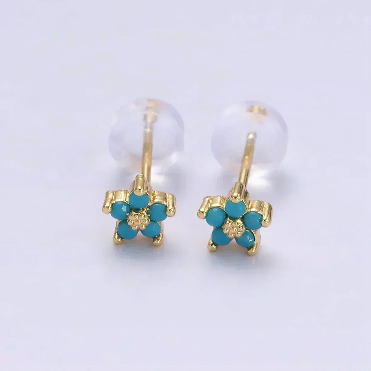 Boucles d'oreilles avec motif floral délicat