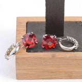 Boucles d'oreilles avec rubis et diamant