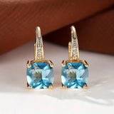 Boucles d'oreilles créoles en pierre saphir mystique | Or