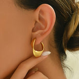 Boucles d'oreilles créoles sculptées en croissant | Or