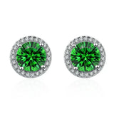 Boucles d'oreilles en émeraudes et diamants