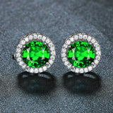 Boucles d'oreilles en émeraudes et diamants