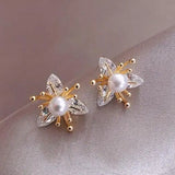 Boucles d'oreilles en fleurs avec cristaux et perles