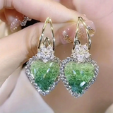 Boucles d'oreilles en forme de cœur brillantes et vertes