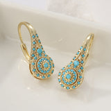 Boucles d'oreilles en or avec turquoise