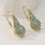 Boucles d'oreilles en or avec turquoise