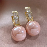 Boucles d'oreilles en or avec zircon rose