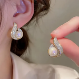 Boucles d'oreilles en zircon avec perles brillantes