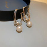Boucles d'oreilles fascinantes avec perles | Or
