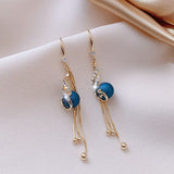 Boucles d'oreilles festives avec des marguerites bleues | Or