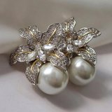 Boucles d'oreilles pendantes avec fleur et marguerite