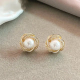 Boucles d'oreilles pendantes en or avec perles rondes et zirconia