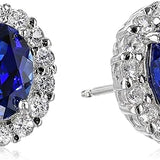 Boucles d'oreilles puces en saphir blanc ovale | Or blanc