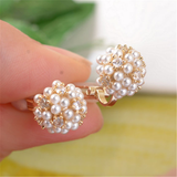 Boucles d'oreilles rétro avec ornement en perles