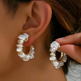 Boucles d'oreilles rétro avec perle blanche