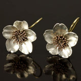 Boucles d'oreilles rétro et or avec des fleurs | Argent
