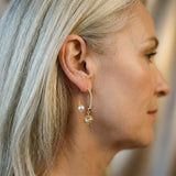 Boucles d'oreilles rétro en or avec des marguerites