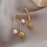 Boucles d'oreilles rétro en or avec des marguerites