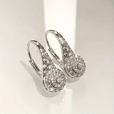 Boucles d'oreilles rondes avec goutte brillante