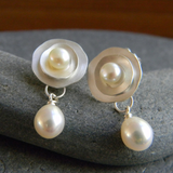 Boucles d'oreilles vintage en argent avec des marguerites