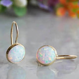 Boucles d'oreilles vintage en or avec pierre opale
