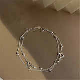 Bracelet ajustable avec cœur en argent