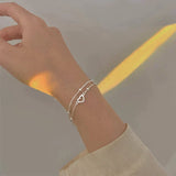 Bracelet ajustable avec cœur en argent