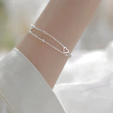 Bracelet ajustable avec cœur en argent