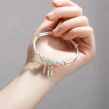 Bracelet ajustable avec médaille à trois feuilles | Argent