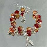 Bracelet avec feuille d'automne et papillon | Argent