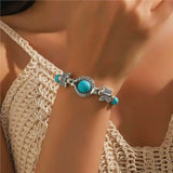 Bracelet en or blanc avec des papillons