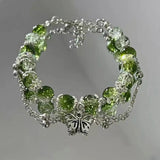 Bracelet rétro avec papillon et perles vertes | Argent