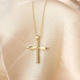 Collier avec croix et ailes d'ange | Or