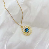 Collier avec médaillon planétaire, constellations et étoile dorée