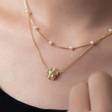 Collier de fleurs avec perles doubles | Or