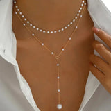 Collier de perles à deux rangs avec pendentifs