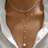 Collier de perles à deux rangs avec pendentifs