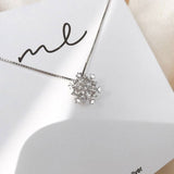 Collier en cristal avec neige brillante en or et argent