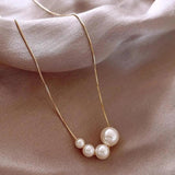 Collier en perles dorées