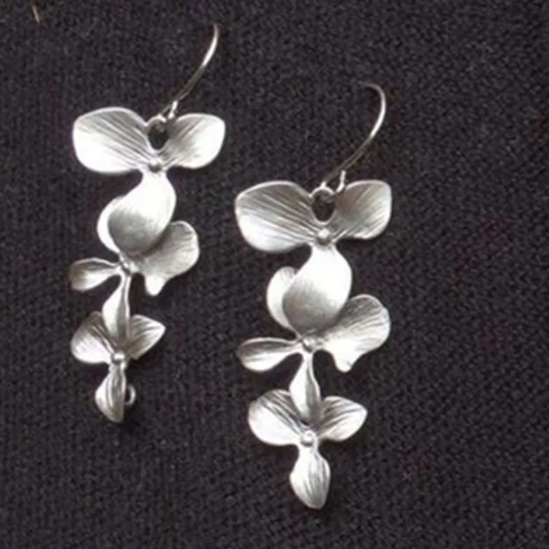 Collier et boucles d'oreilles en forme de fleurs | Argent