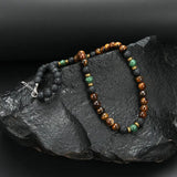 Collier luxueux en perles d'œil de tigre avec fermoir | Or