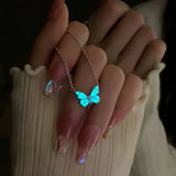 Ensemble collier et bracelet avec papillon bleu lumineux | Or