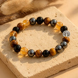 Bracelet "Force & Lumière" en Oeil de Tigre, Citrine, Hématite & Obsidienne