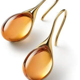 Boucles d'oreilles pendantes chics avec cristaux