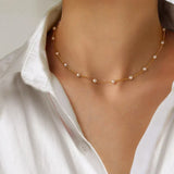 Petite chaîne en perles dorées